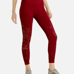 Ideology perforated mid rise leggings. Red. XL